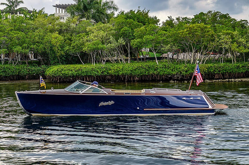 Classic wooden boat showcasing electric innovation