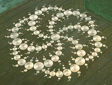 Intricate crop circle design in a field